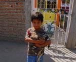 A boy and his chicken in Mazatlan